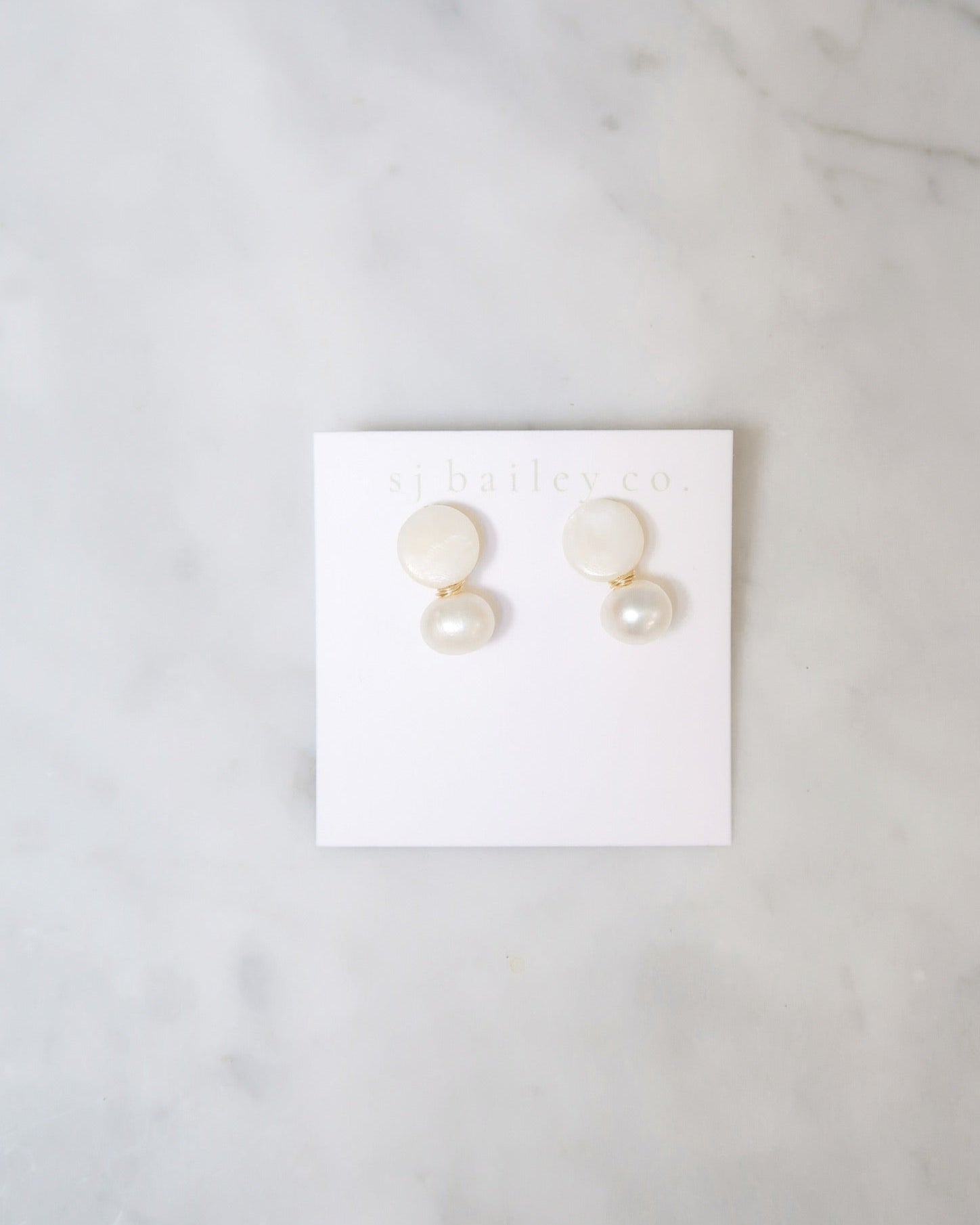 The Darcy in Pearl With Gold Wiring