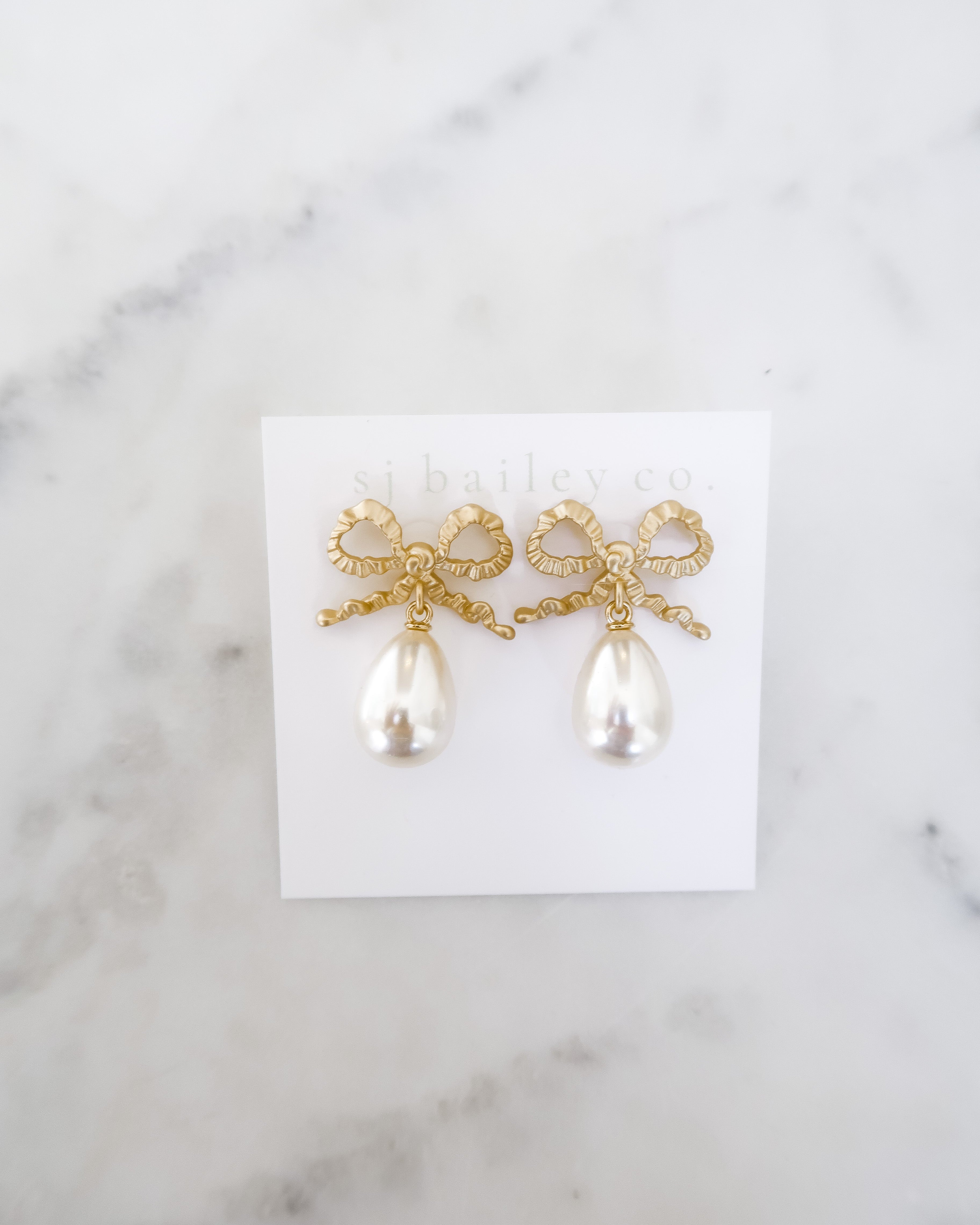 Golden Bow and Pearl Drop Earrings